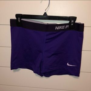 Purple Nike pro shorts, size large